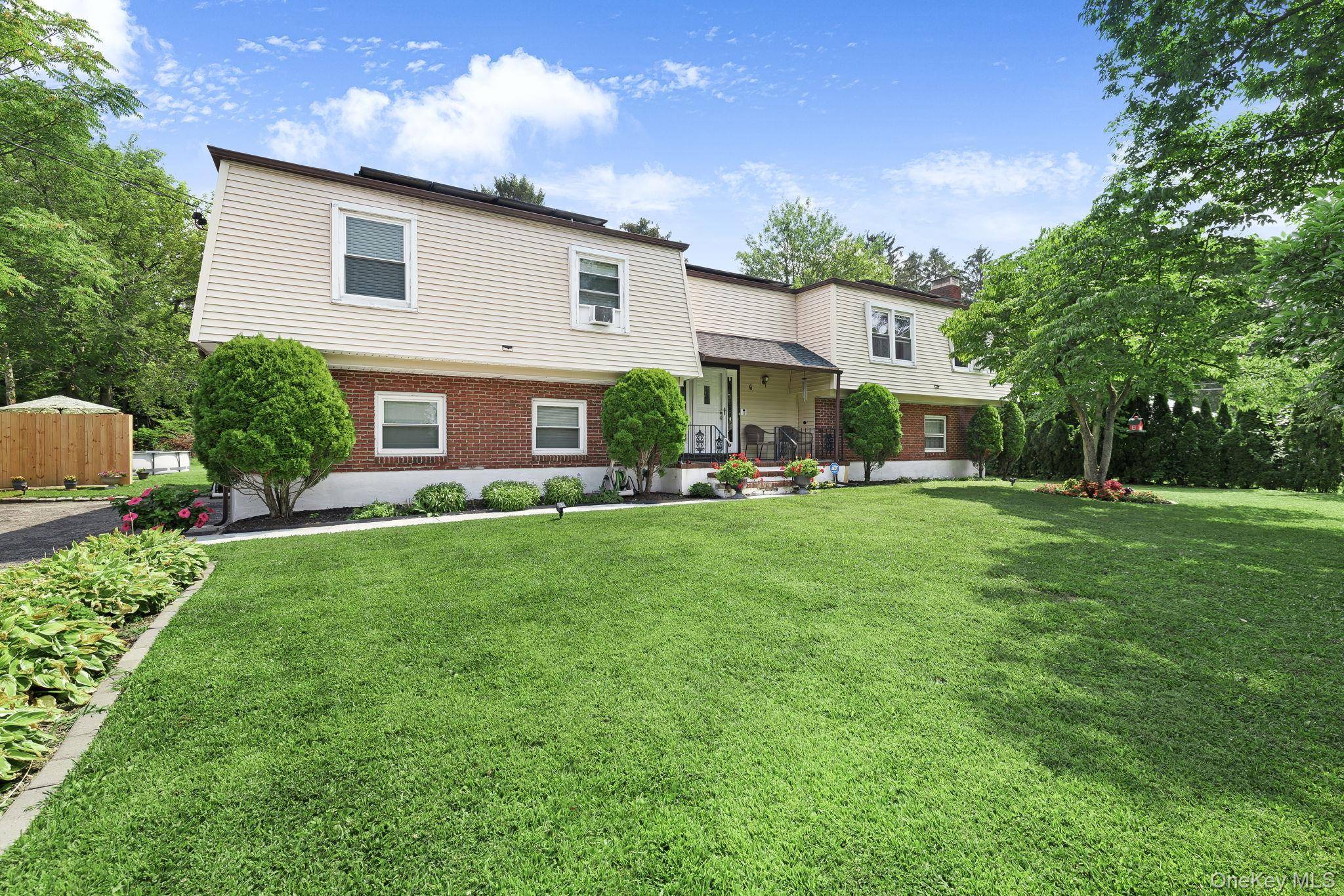 Welcome to this beautifully updated split level home in the heart of New Windsor !