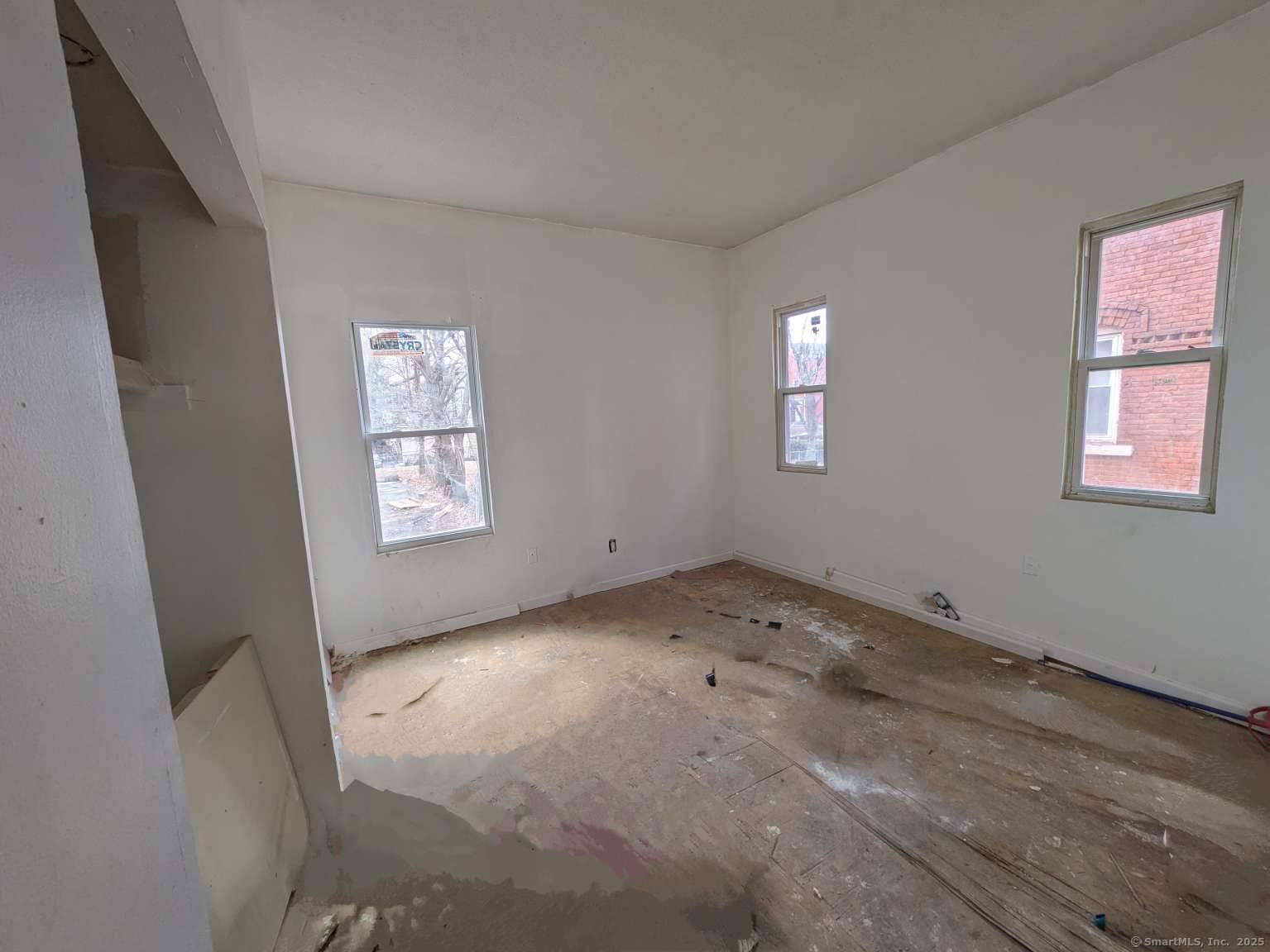 Perfect for investors or owner occupants, this well maintained 4 family property offers a balanced mix of unit sizes, premium upgrades, and strong rental potential.