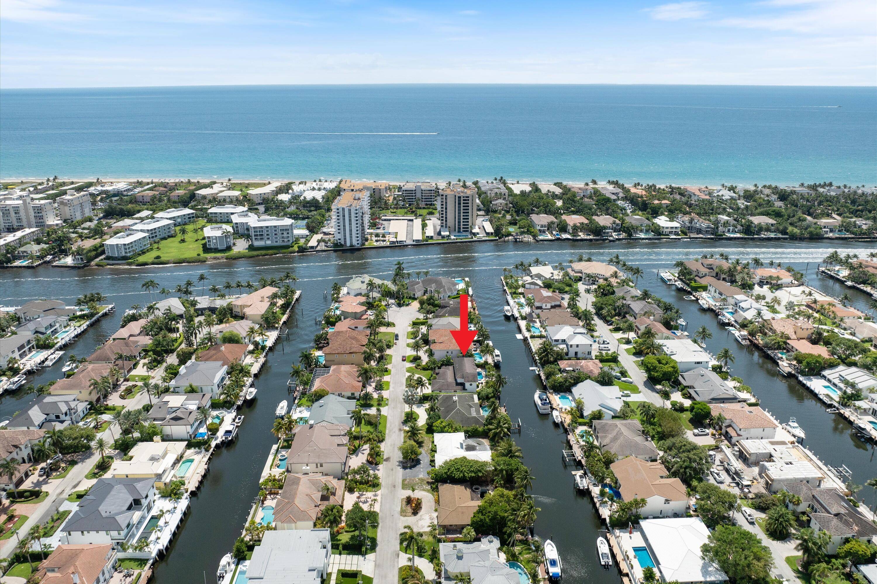 Discover the epitome of refined coastal living in this exceptional waterfront residence, ideally situated in East Delray Beach's sought after Tropic Isle community.