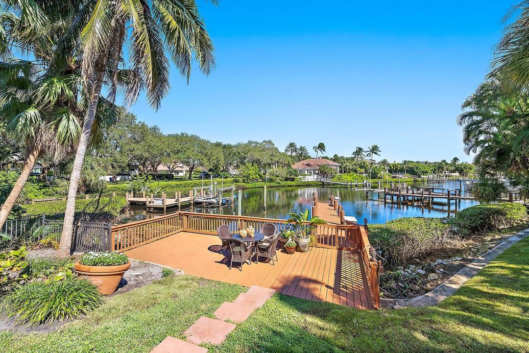 Nestled in the prestigious Admirals Cove community, this exceptional residence offers a blend of luxury and tropical charm.