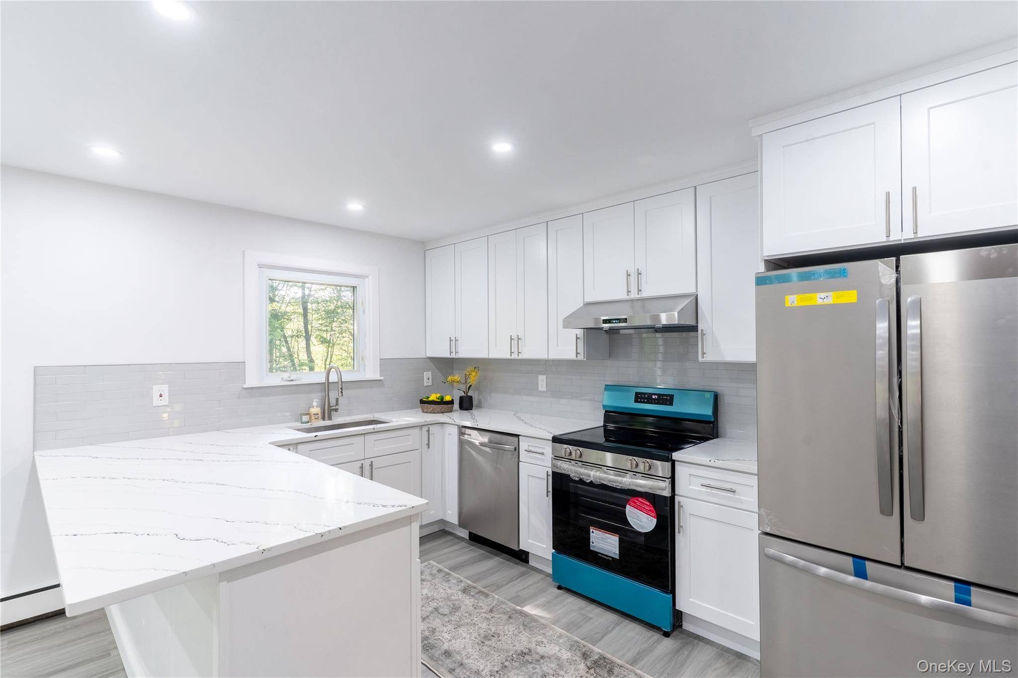 Tucked away at the end of a peaceful cul de sac and situated on just under an acre, this beautifully updated Colonial combines modern comforts with a serene, nature filled ...