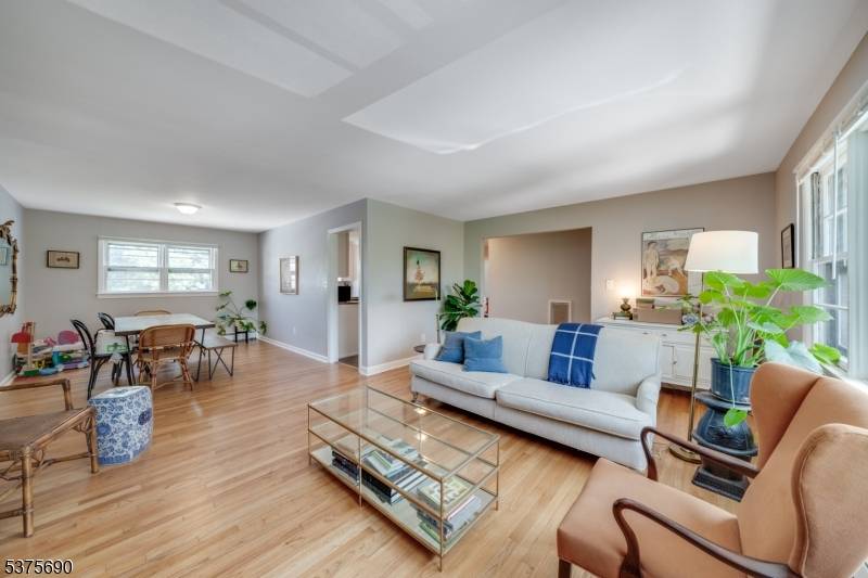 Welcome to 61 5th Street Unit 1, a renovated ground floor, 3 bedroom unit situated in the heart of vibrant South Orange.