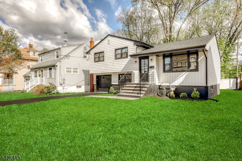 Welcome to 27 Merritt Ave, a tastefully renovated 3 bedroom, 1.