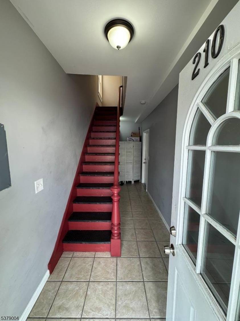 Welcome to 210 Clark Place, a Well Maintained Turnkey Two Family Home in the thriving Port Elizabeth area.