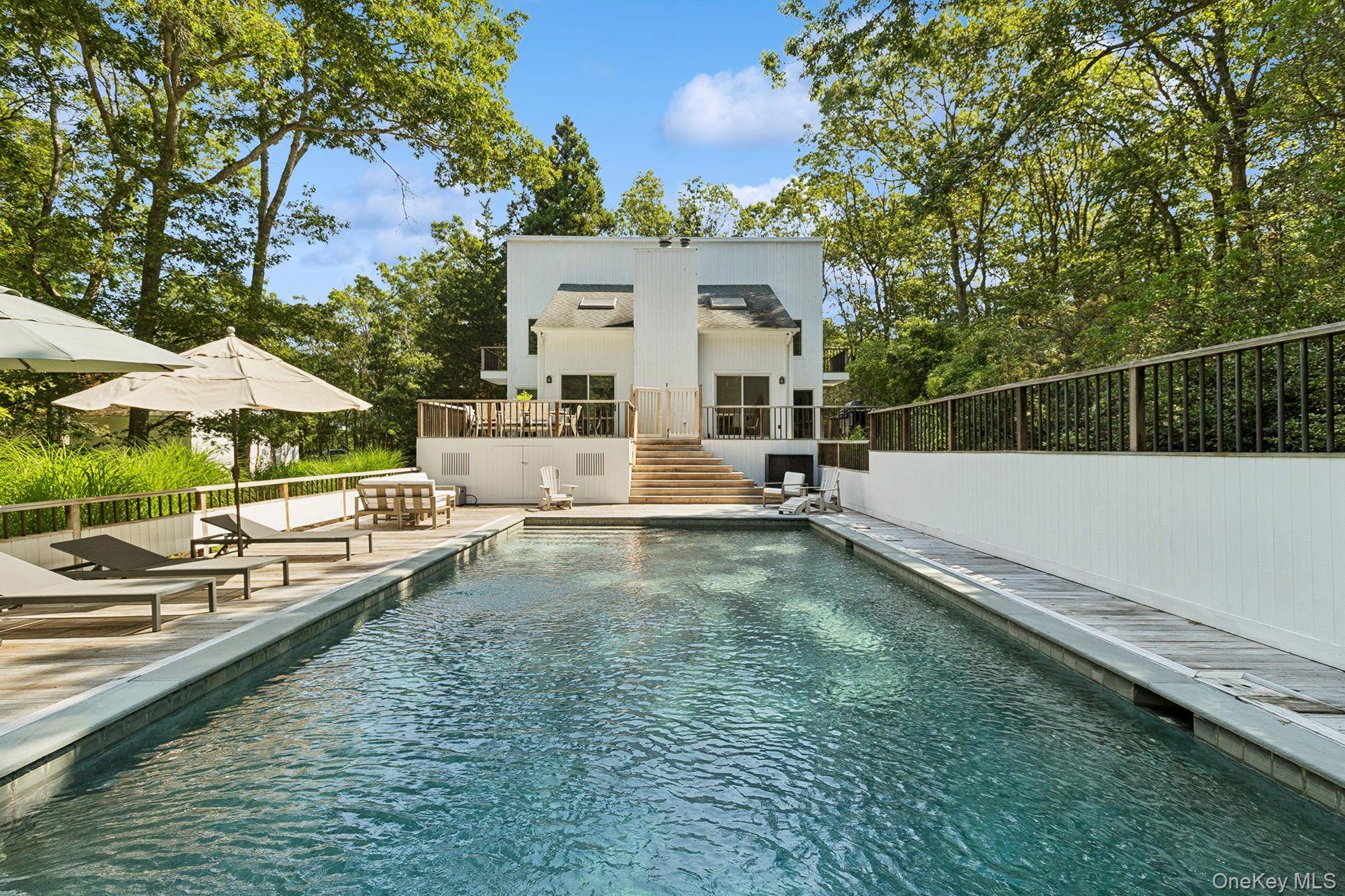 Contemporary Style with Pool amp ; Privacy Tucked away on a private and serene 0.