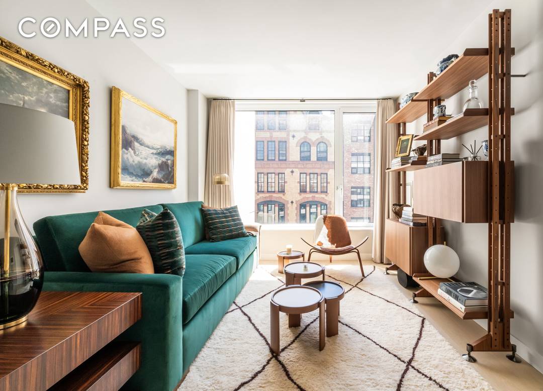 Residence 517 at 450 Washington Street is a sun drenched, meticulously designed one bedroom overlooking the historic architecture and leafy treetops of Tribeca.