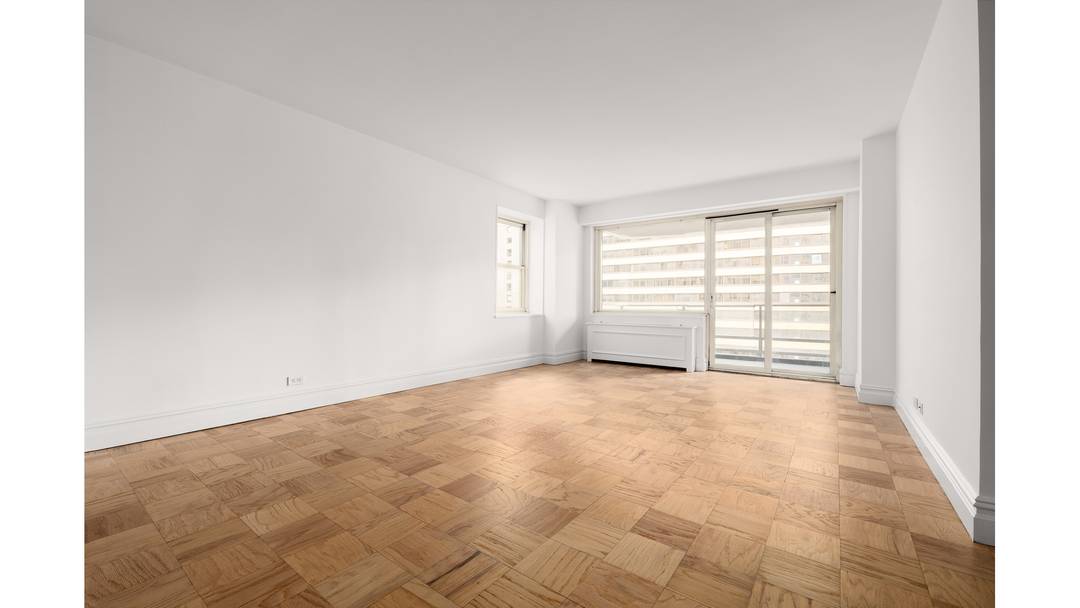 Welcome to residence 25B at 159 West 53rd Street, a high floor two bedroom, two bath condominium offering elevated living in the heart of Midtown.