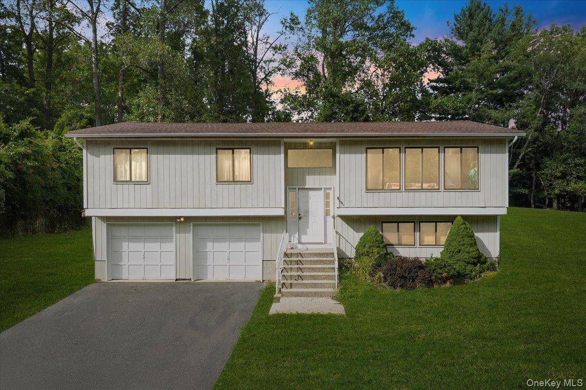 Discover the potential of this inviting Hi Ranch located at 5 John F.