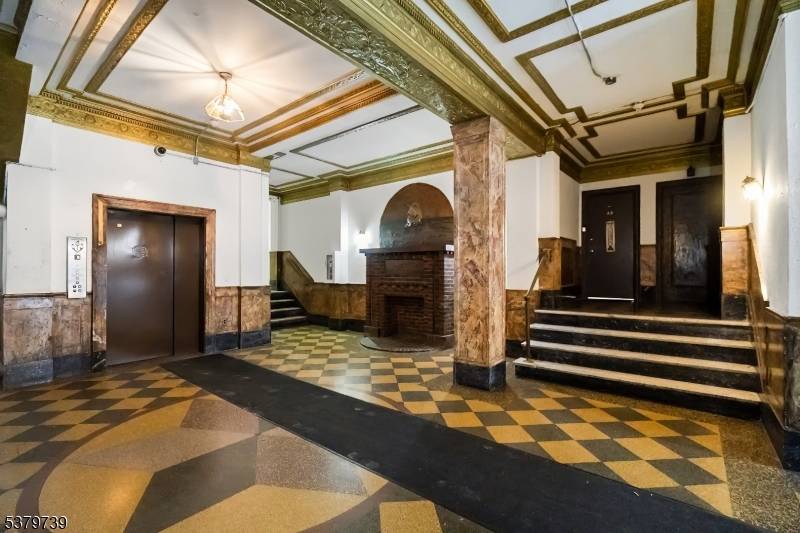 Welcome to urban living in this spacious first floor one bedroom condo at The Madrid in the vibrant JSQ neighborhood of Jersey City.