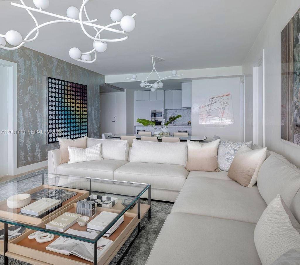 2 Bedroom Den, 3 Bath Unit on the sand at 57 Ocean Millionaire's Row.