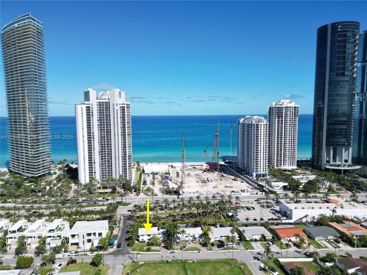 Development opportunity. Rare corner lot duplex directly in front of the beach and is currently a successful Airbnb rental, bringing in steady income.