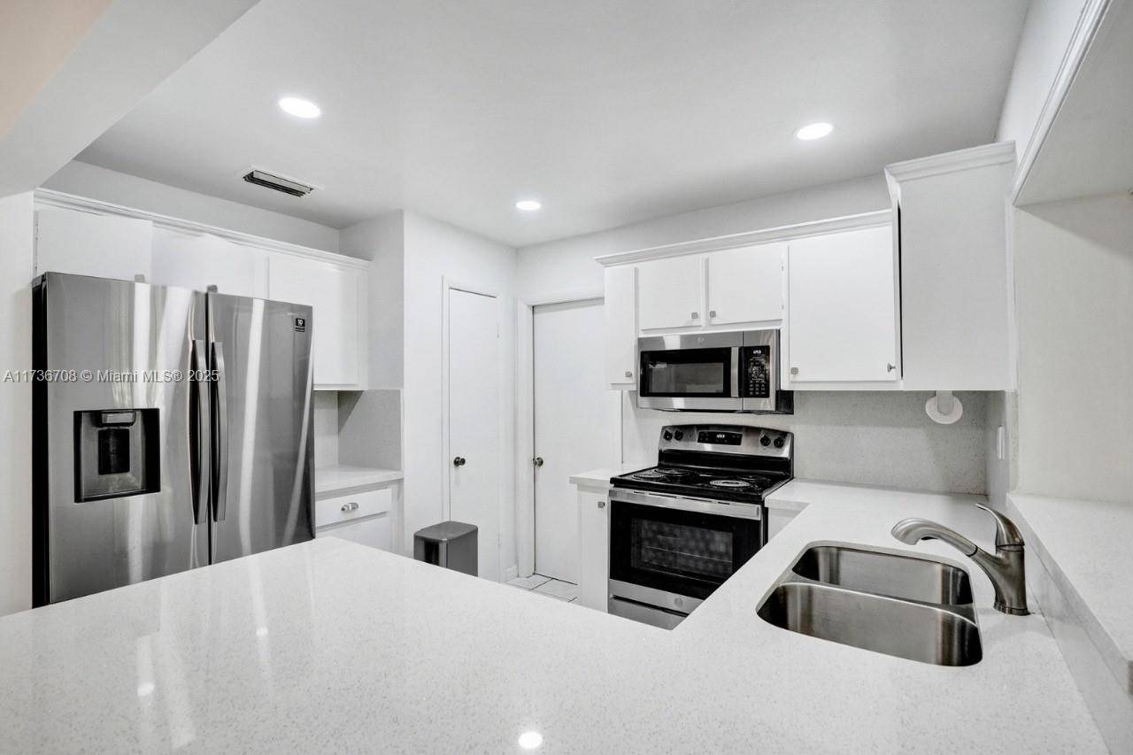 Welcome to 11015 SW 159th Ter, a charming 4 bed, 3 bath home in the heart of Palmetto Estates, Miami.