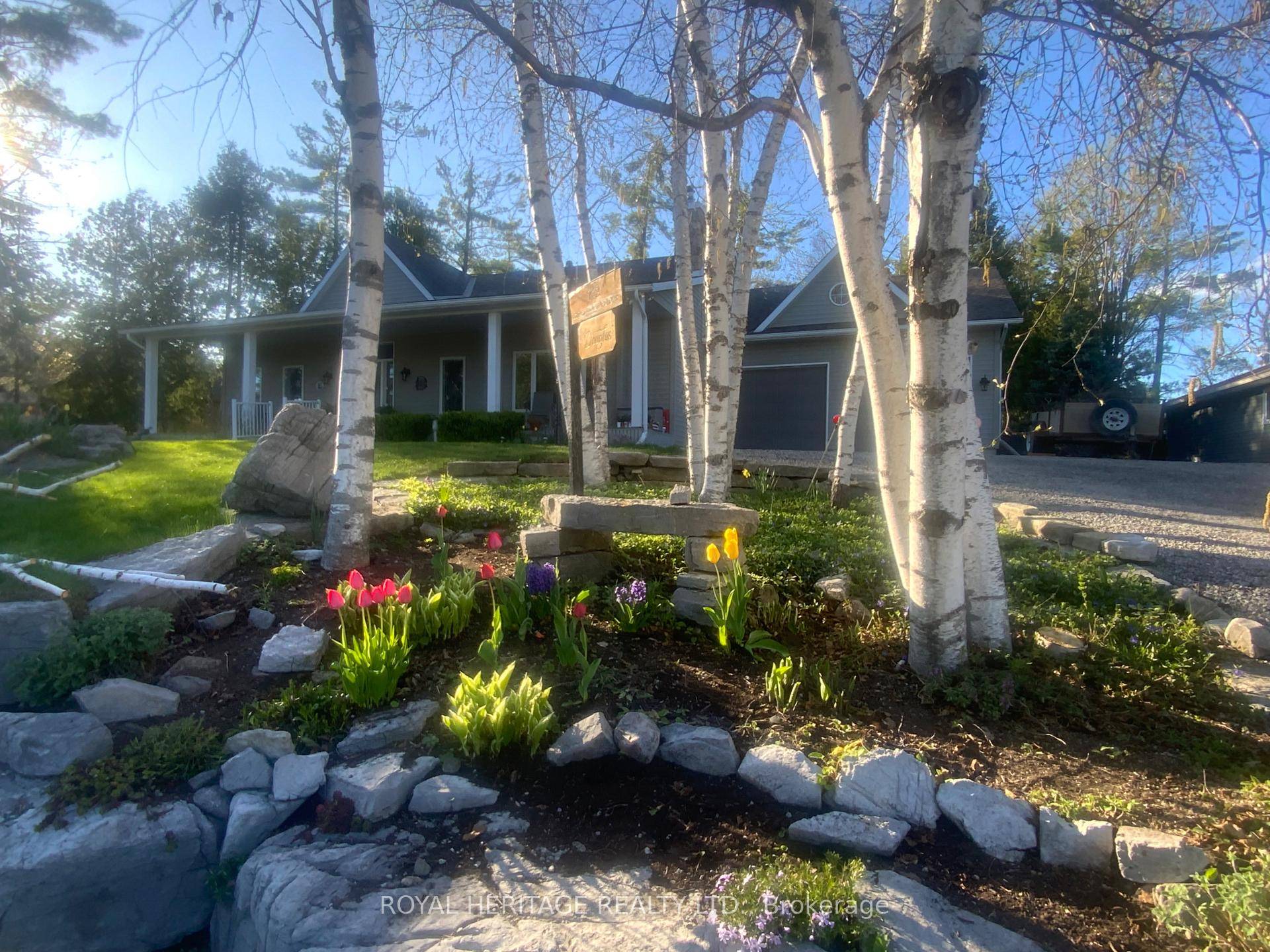 Captivating Coach Lamp Home with views of Pigeon Lake walking distance to Downtown Bobcaygeon.