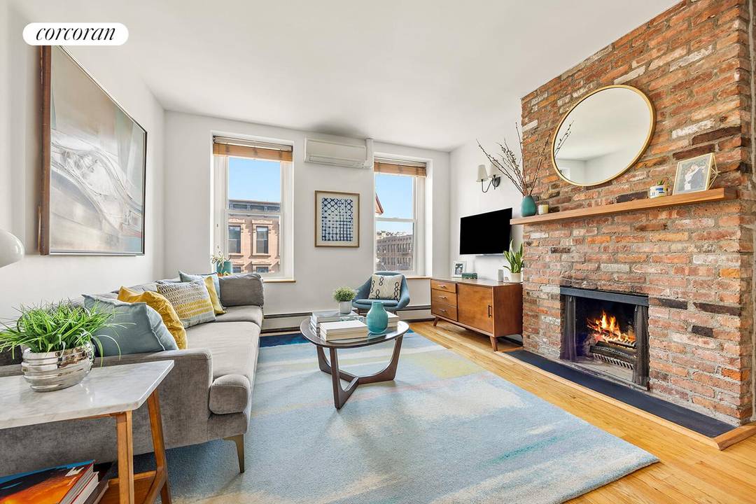 This bright, top floor two bedroom apartment offers classic prewar character in a pet friendly, 8 unit co op.