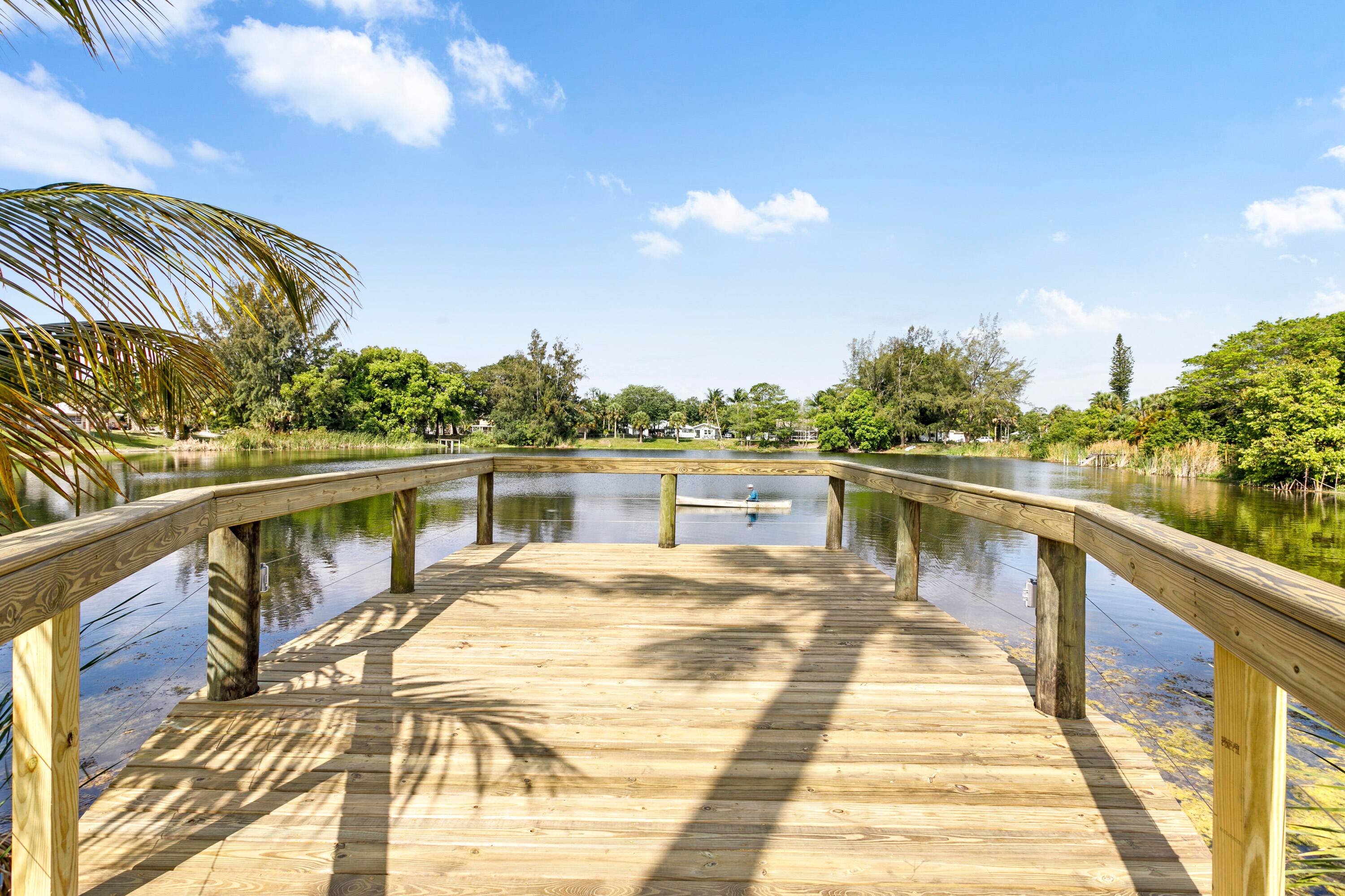 Stunning lakefront views from the brand new dock and backyard of this updated freshly painted solid CBS three bedroom, two bath home !