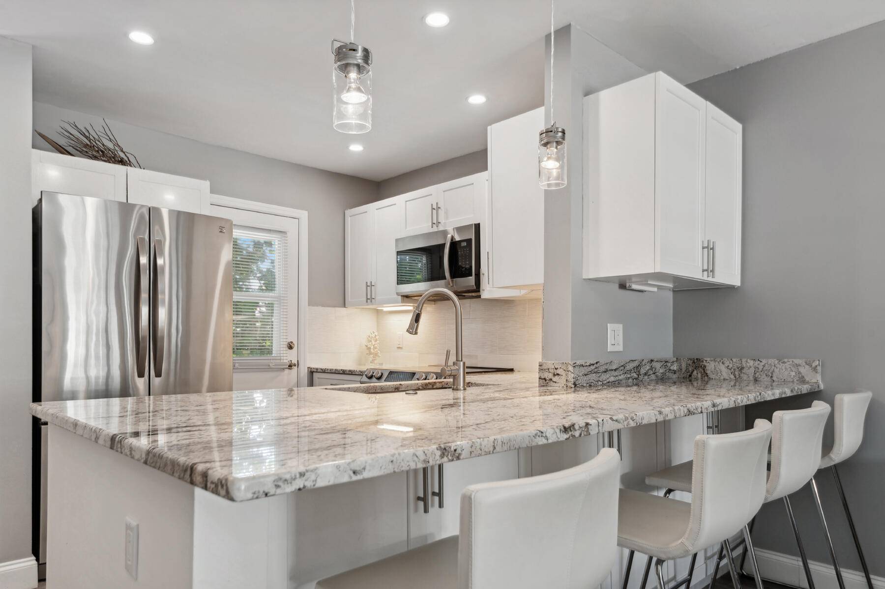 IN A MARKET OF CHOICES BE SURE TO BUY THE BEST 311 is OCEANFRONT ON SAND and FULLY RENOVATED and YOU CAN CONVERT THIS INTO 2 BEDROOMS !
