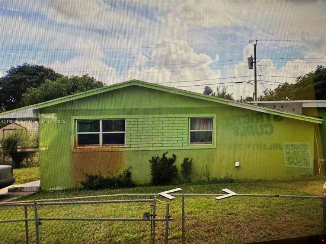 Miami Gardens 4 bedroom, 2 bath ranch home in the heart of Miami Gardens, offering a comfortable single story layout with a spacious living area and latge back yard.