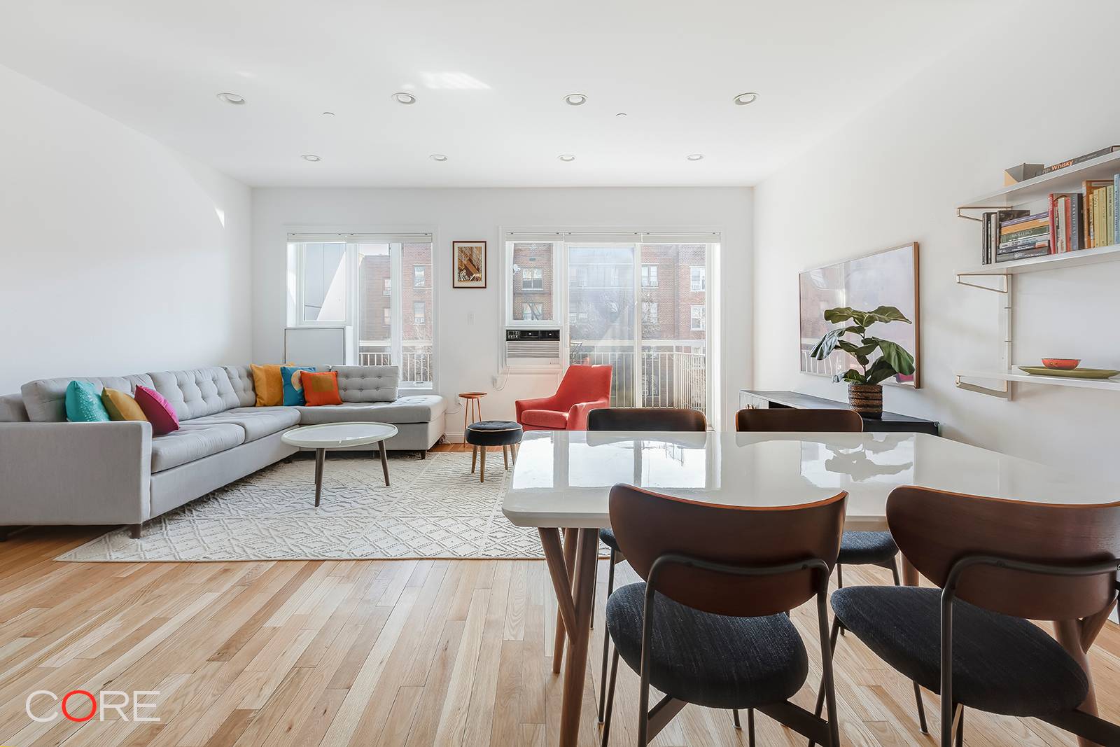 Welcome home to this sunny and sprawling east facing two bed, two bath, with the potential to be converted into three bedrooms at The Waterfalls Condominium in Ditmas Park.