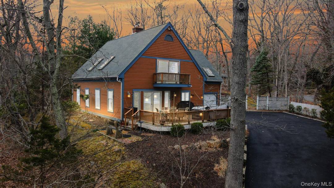 Enjoy the Sounds of Silence at this Hill Top Chalet Overlooking the North Fork's Mattituck Inlet.
