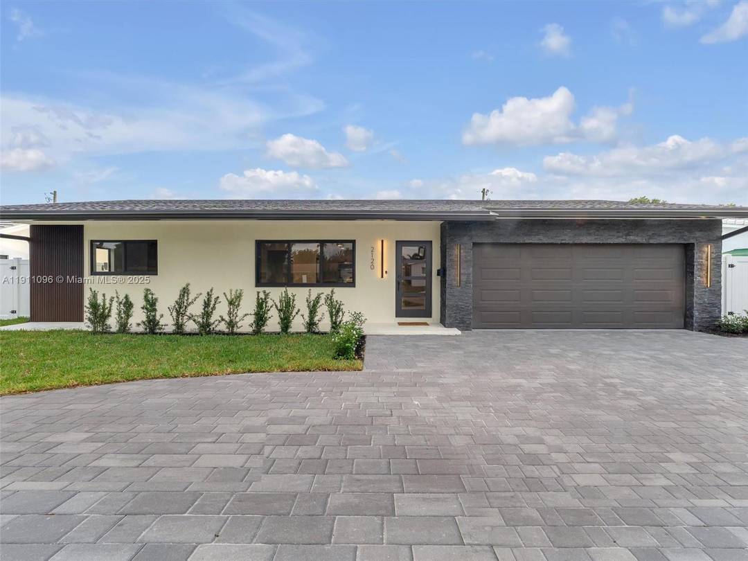 Step into this stunning Coral Ridge residence a complete luxury transformation blending modern design and timeless South Florida charm.