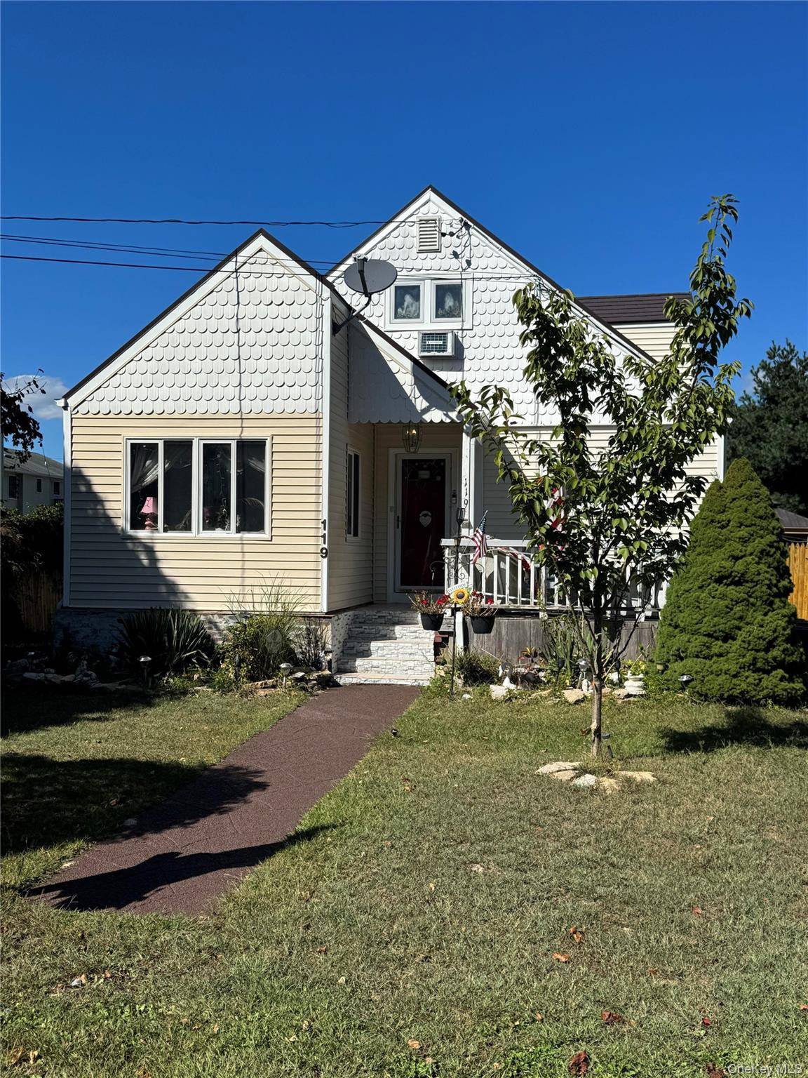 On a quiet street, you will find this Charming, Cape Cod Home in Shirley.