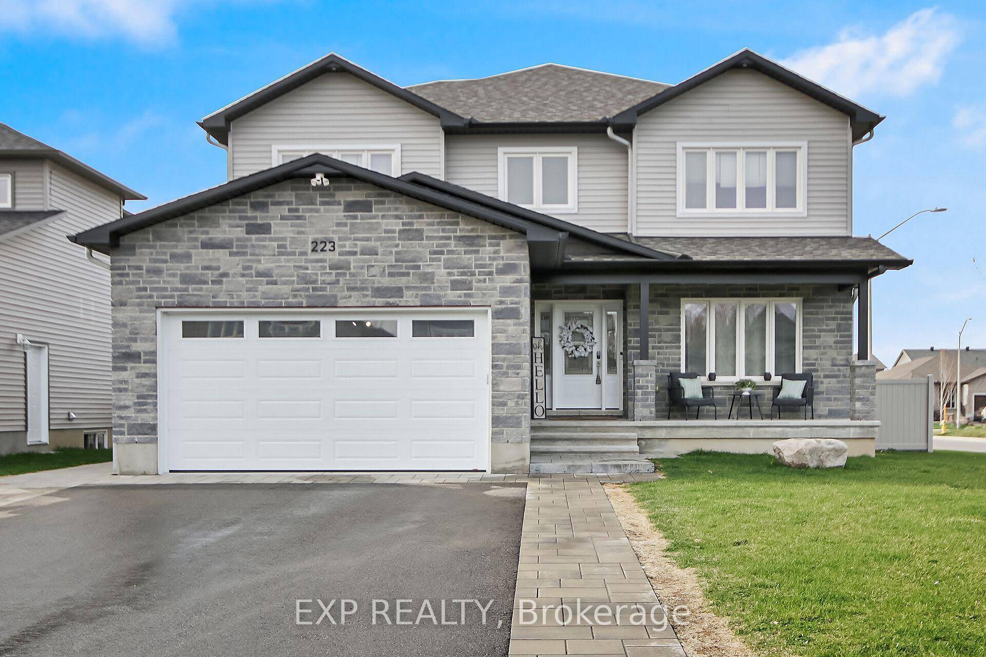 Welcome to 223 Station Trail, where upscale living meets everyday family comfort in the heart of the prestigious Russell Trails community.