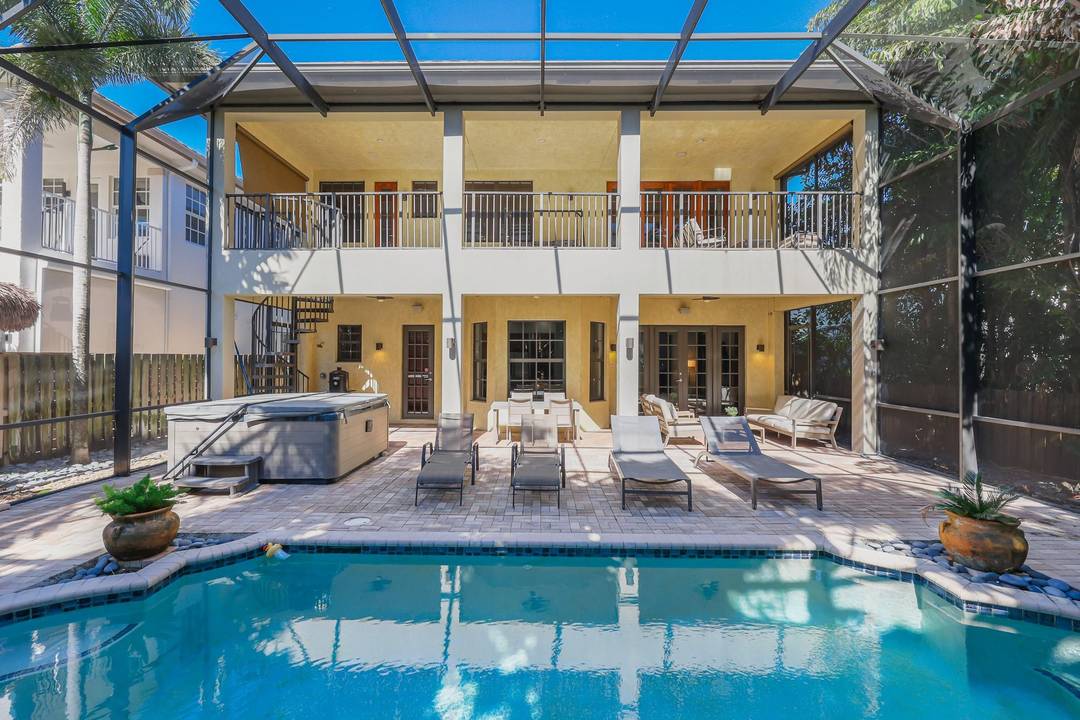 This standout two story residence delivers scale, style, and a premier location.