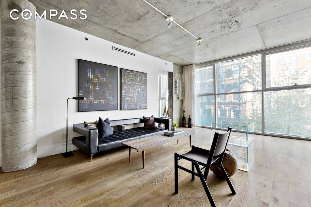 Sleek, ultra modern LES condo with refined industrial finishes and exceptional natural light.