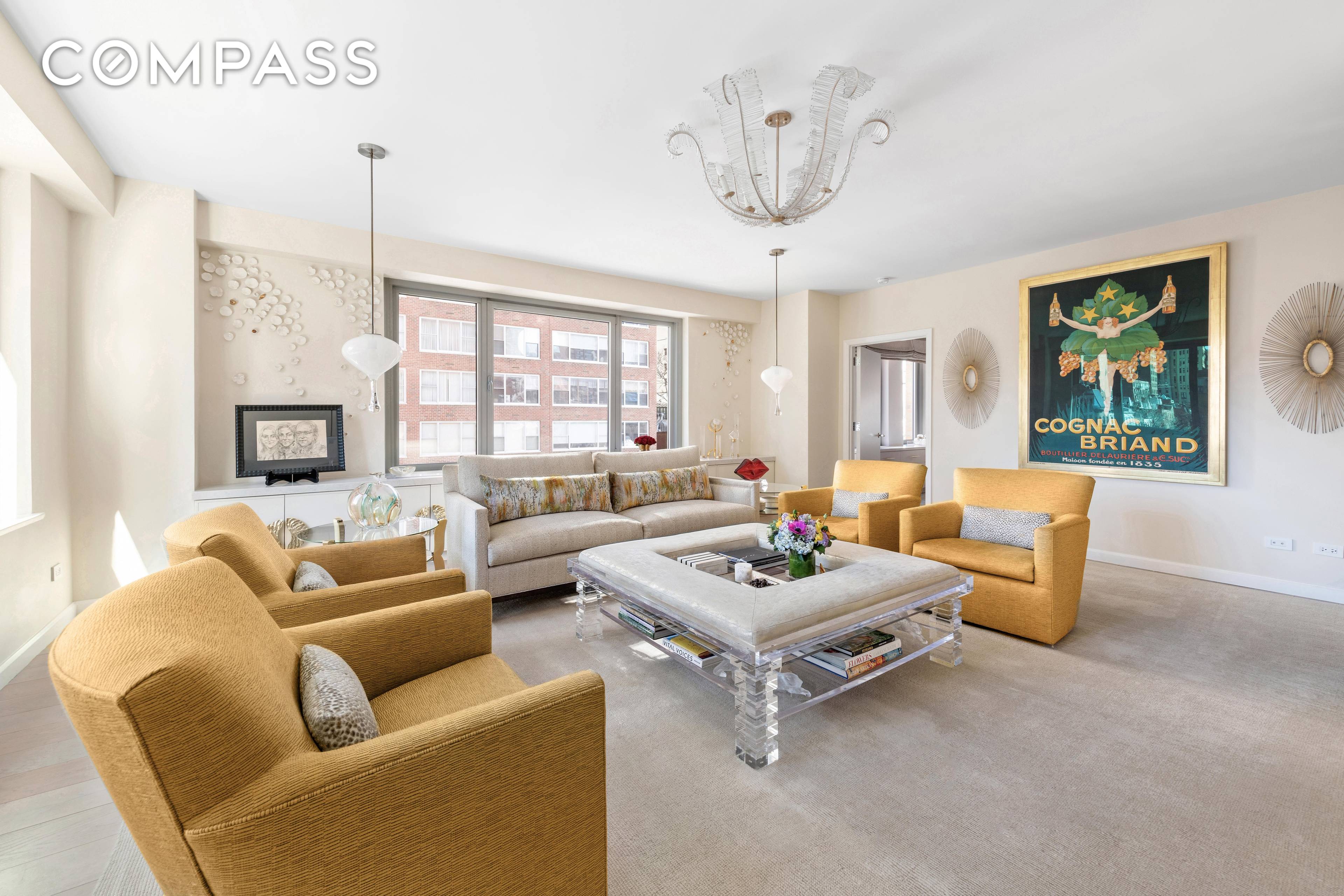 Stunning, sun filled, corner, split two bedroom, two bath plus powder room Condominium in the ideal Upper East Side location.