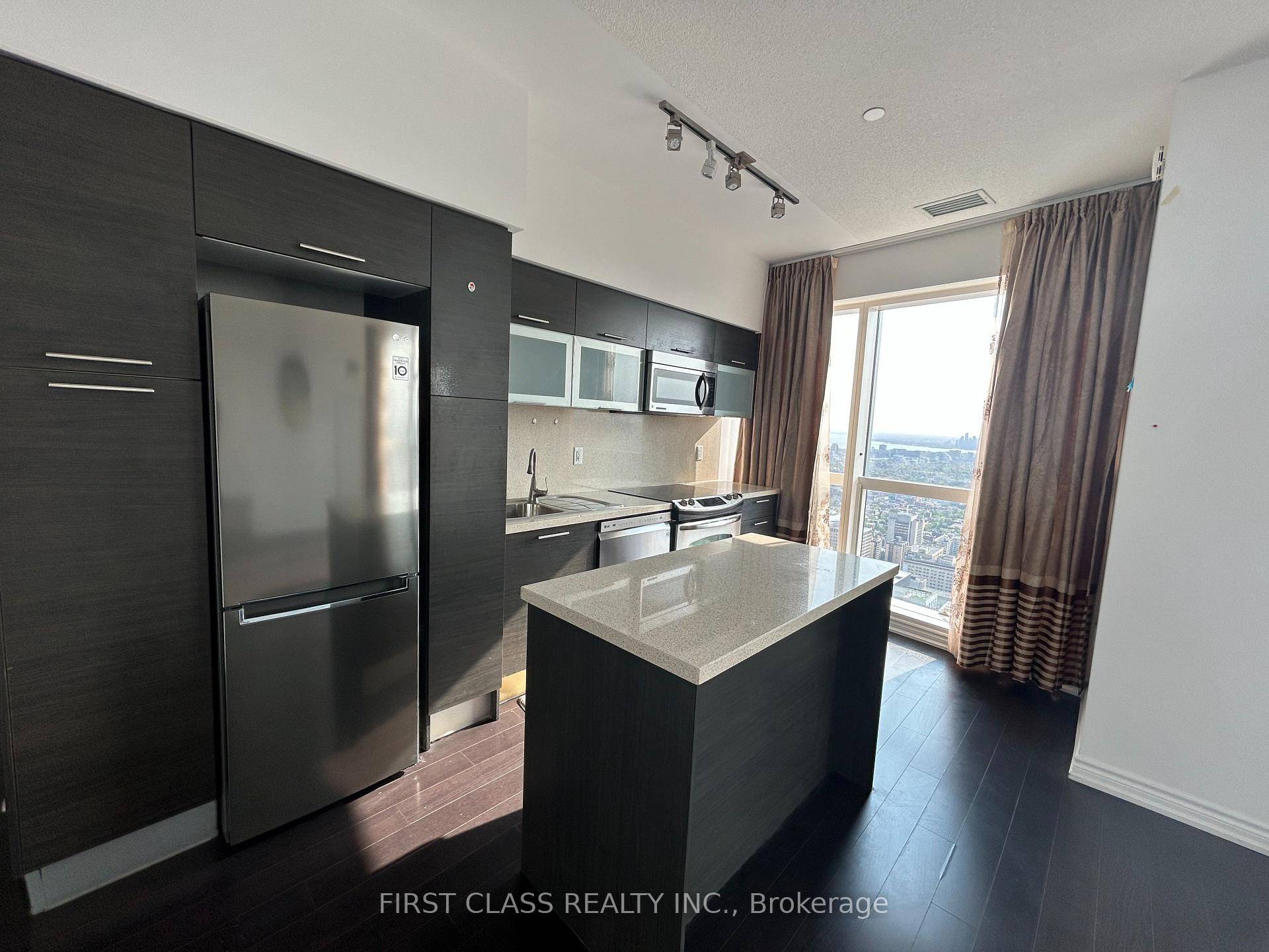 Rare Clear Lake View And City View Aura Condo 2 1, Den Can Be Used As 3rd Br.