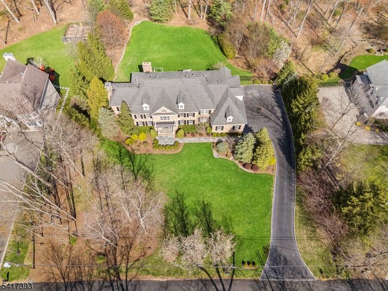 Welcome to a one of a kind custom residence where no expense was spared and every detail was thoughtfully designed.