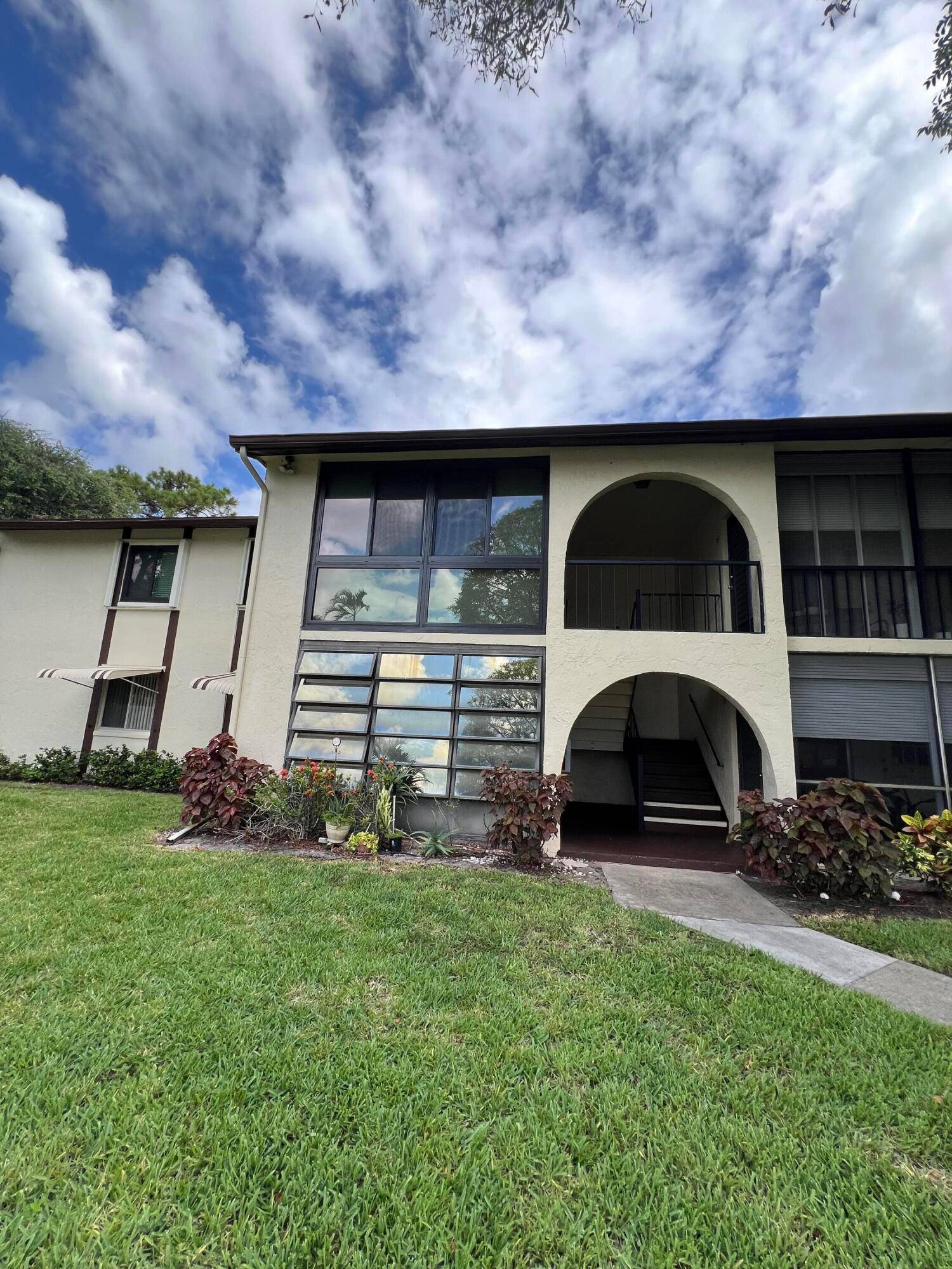 Rented already from May 2025 spacious open floor plan two bedroom, one bathroom first floor apartment, with convenient direct parking access, a new A C unit, private extra storage, and ...