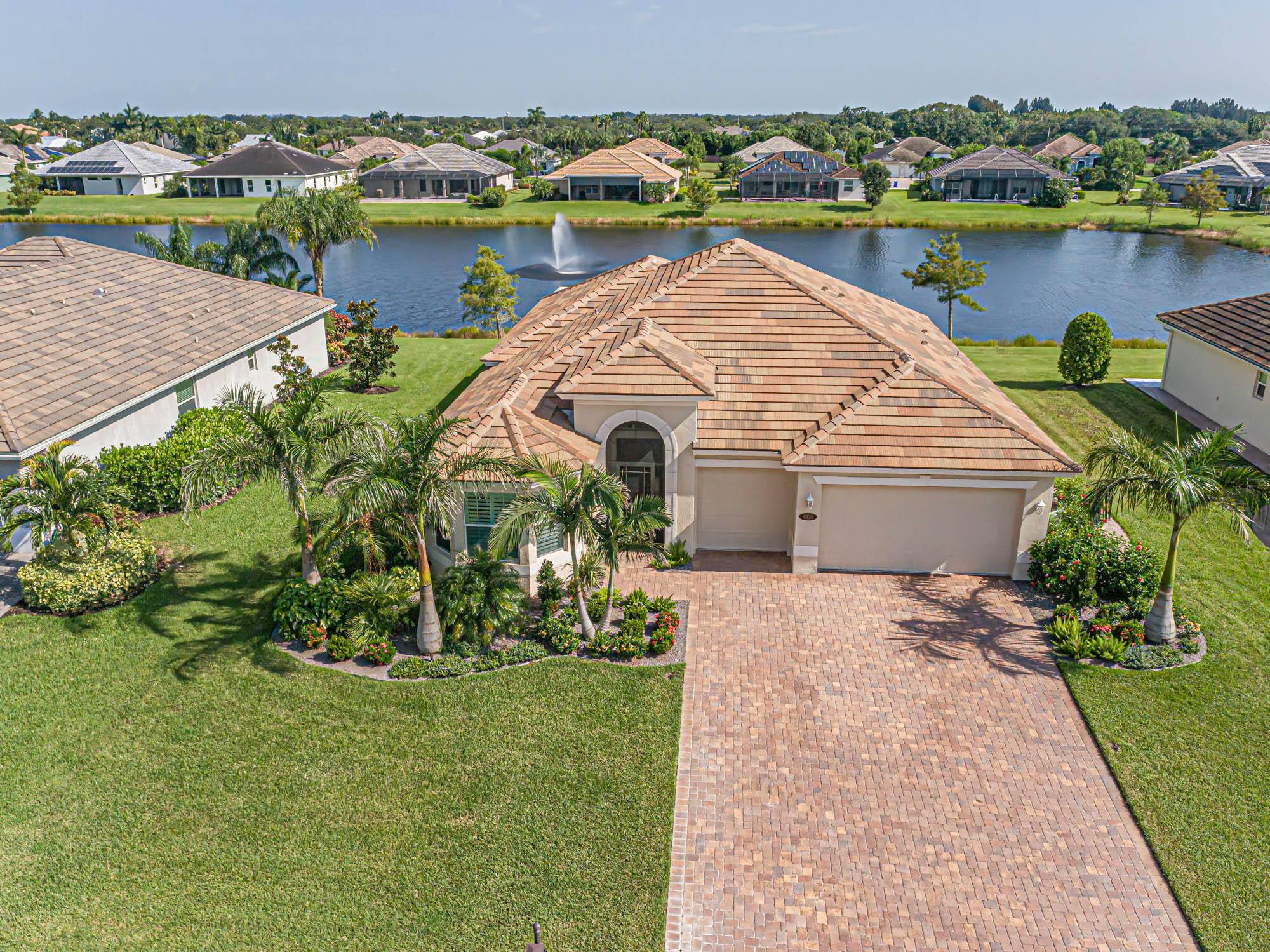 Spectacular GHO built flawless lakefront home radiates pride of ownership.