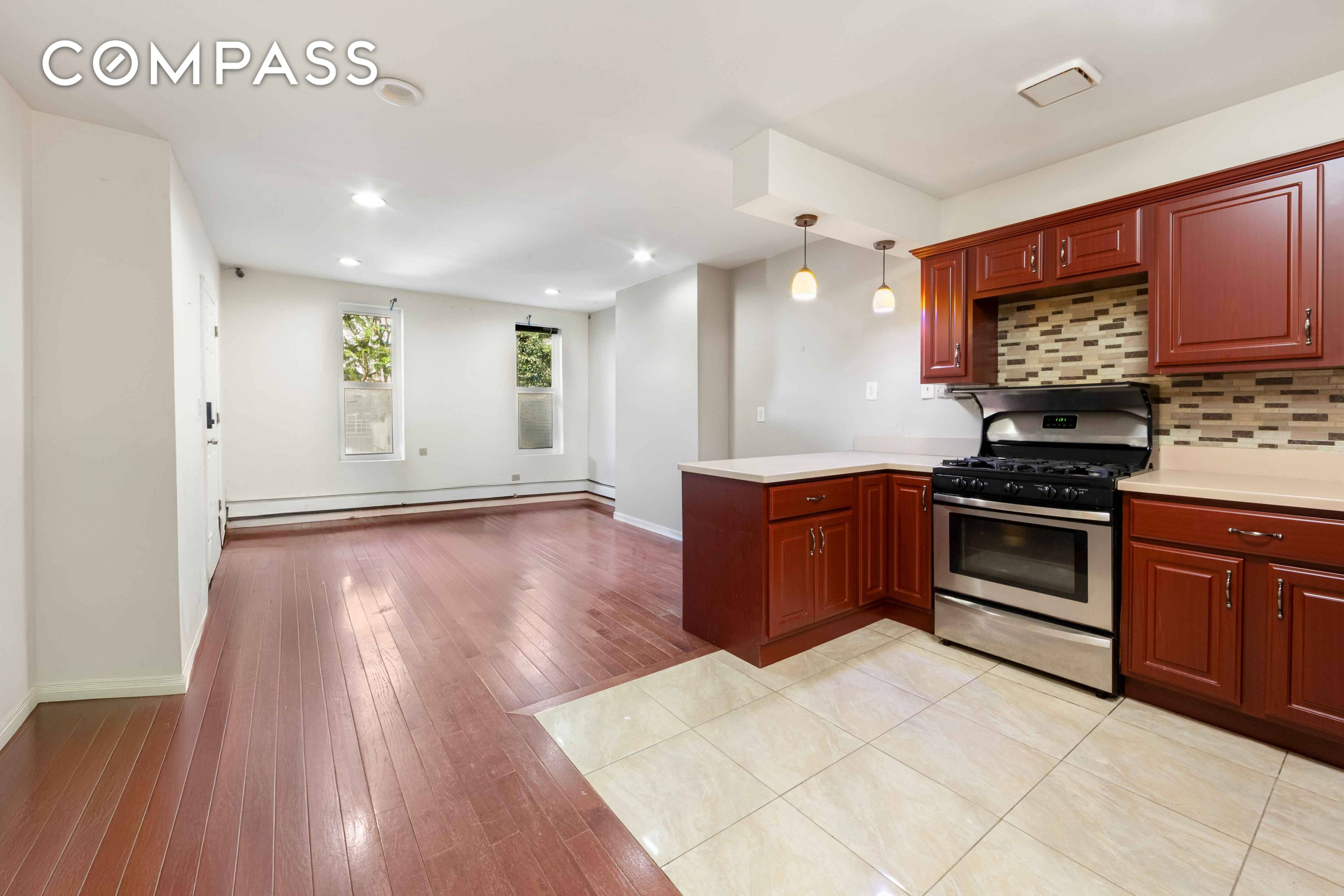 Discover flexibility and opportunity in this legal 3 family townhouse, currently configured as a 2 family with an owner s duplex on the garden and parlor levels, plus a top ...