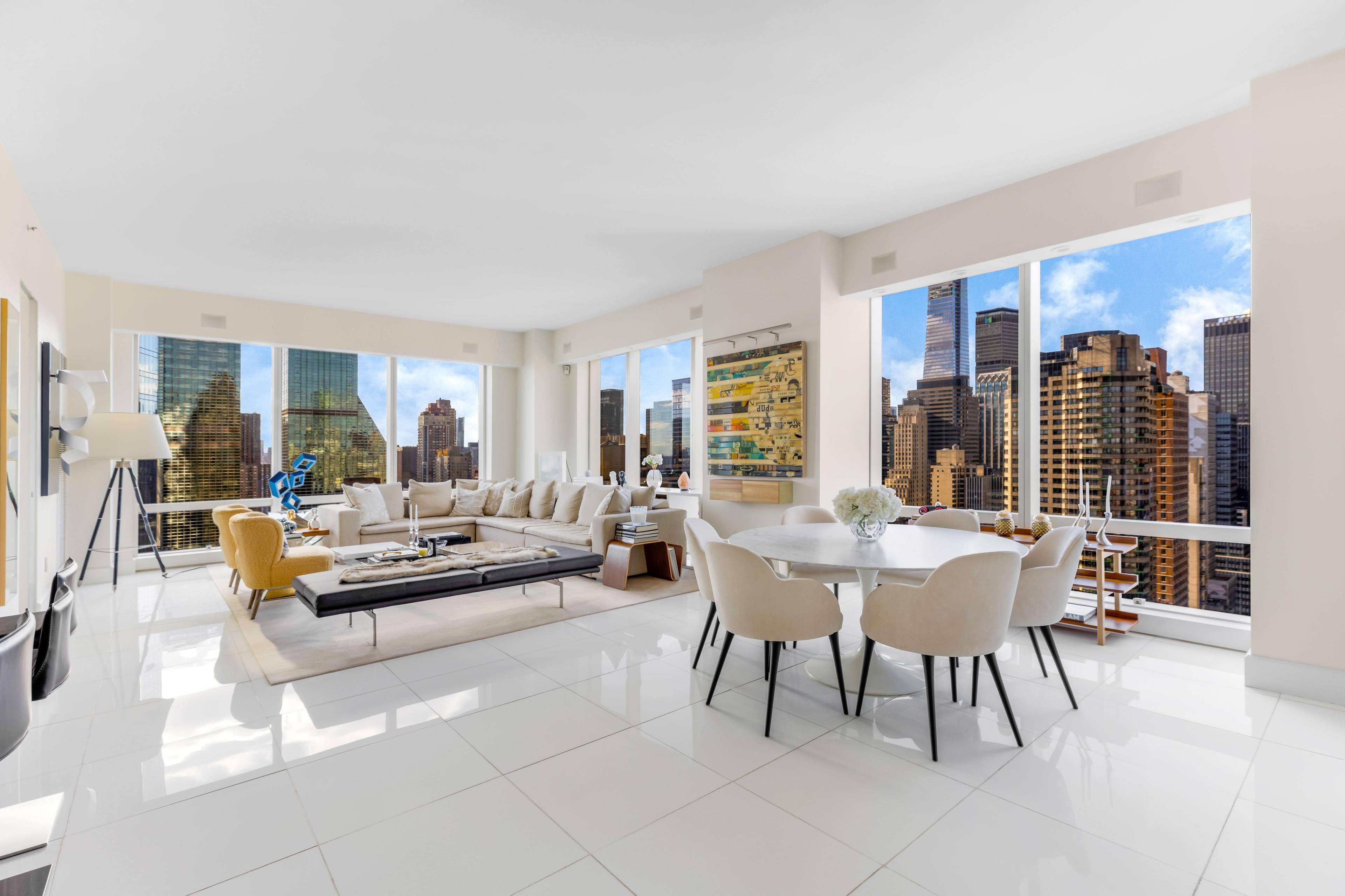 The ultimate modern apartment, enjoy iconic city views in this expansive corner condo, a luminous south west facing 3 bedroom, 3 bathroom home with luxurious amenities and an exciting variety ...