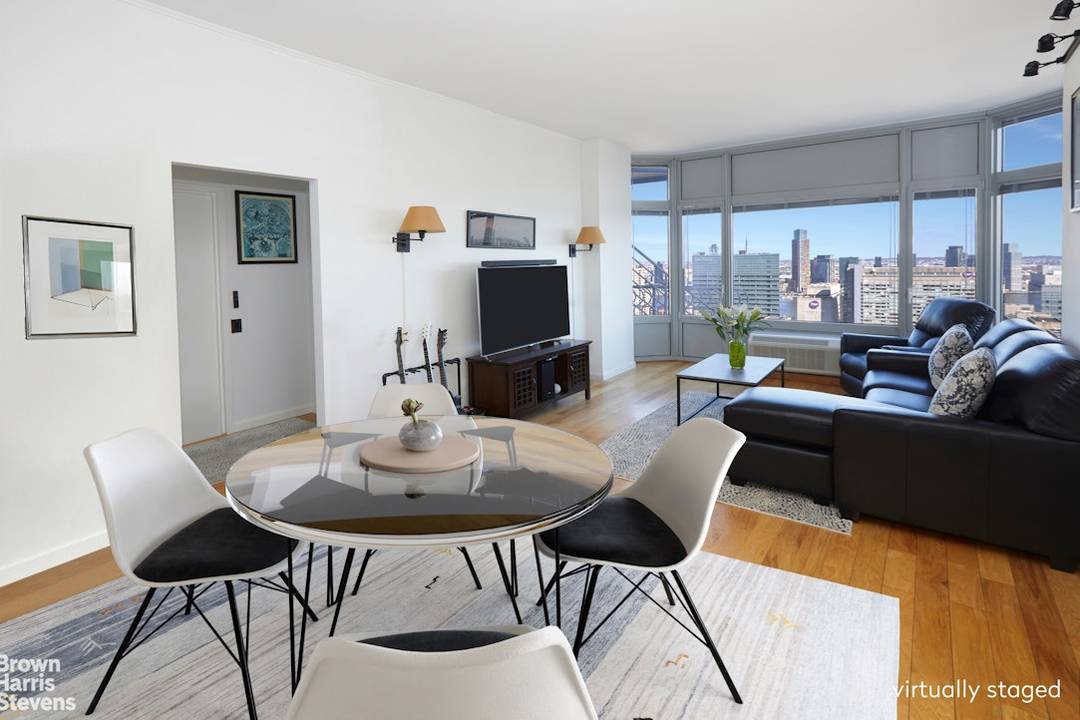 SKY HIGH 1 BEDROOM CONDO RESIDENCE ENDLESS VIEWS, PRIVATE BALCONY Panoramic views to the east and 10 foot ceilings provide an expansive loft like feel in this one bedroom home ...