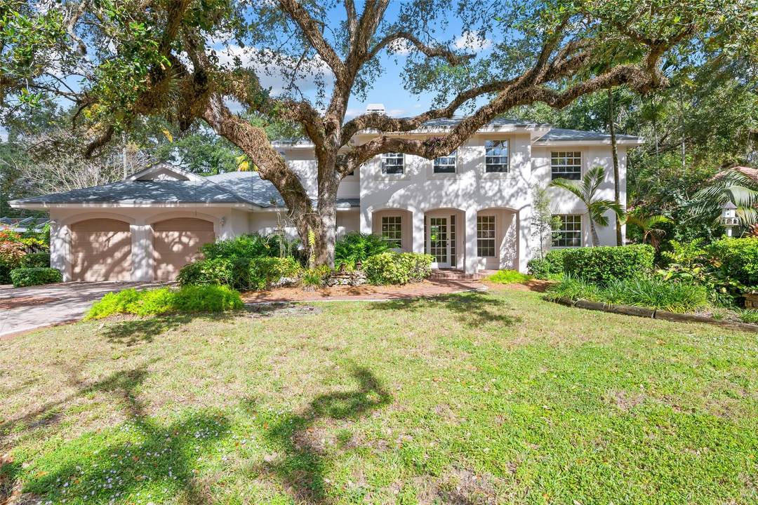 Stunning custom built home located on quiet cul de sac, lined with majestic oak trees.