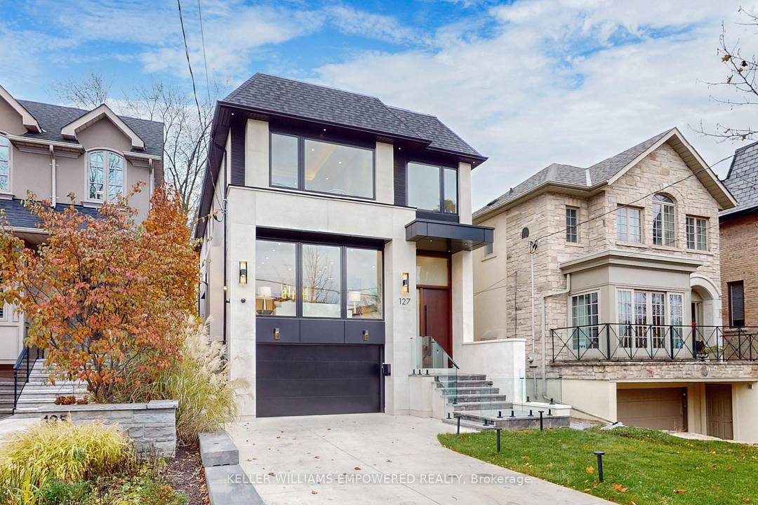 Situated on an exceptional 31 x 150 ft south facing lot, this newly constructed 4, 200 sq.