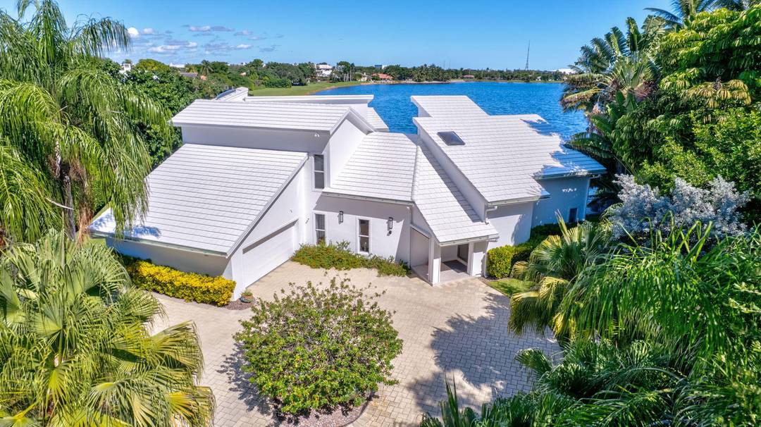 A modern masterpiece. This meticulously renovated contemporary home in the exclusive gated community of Presidential Estates boasts soaring vaulted ceilings and dynamic angular spaces, creating a striking ambiance filled with ...