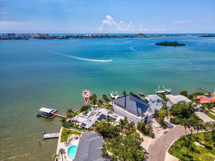 Welcome to this exceptional furnished waterfront residence offering spectacular open water views, elevated indoor outdoor living and the flexibility of an extended stay in one of Tampa Bay's most desirable ...