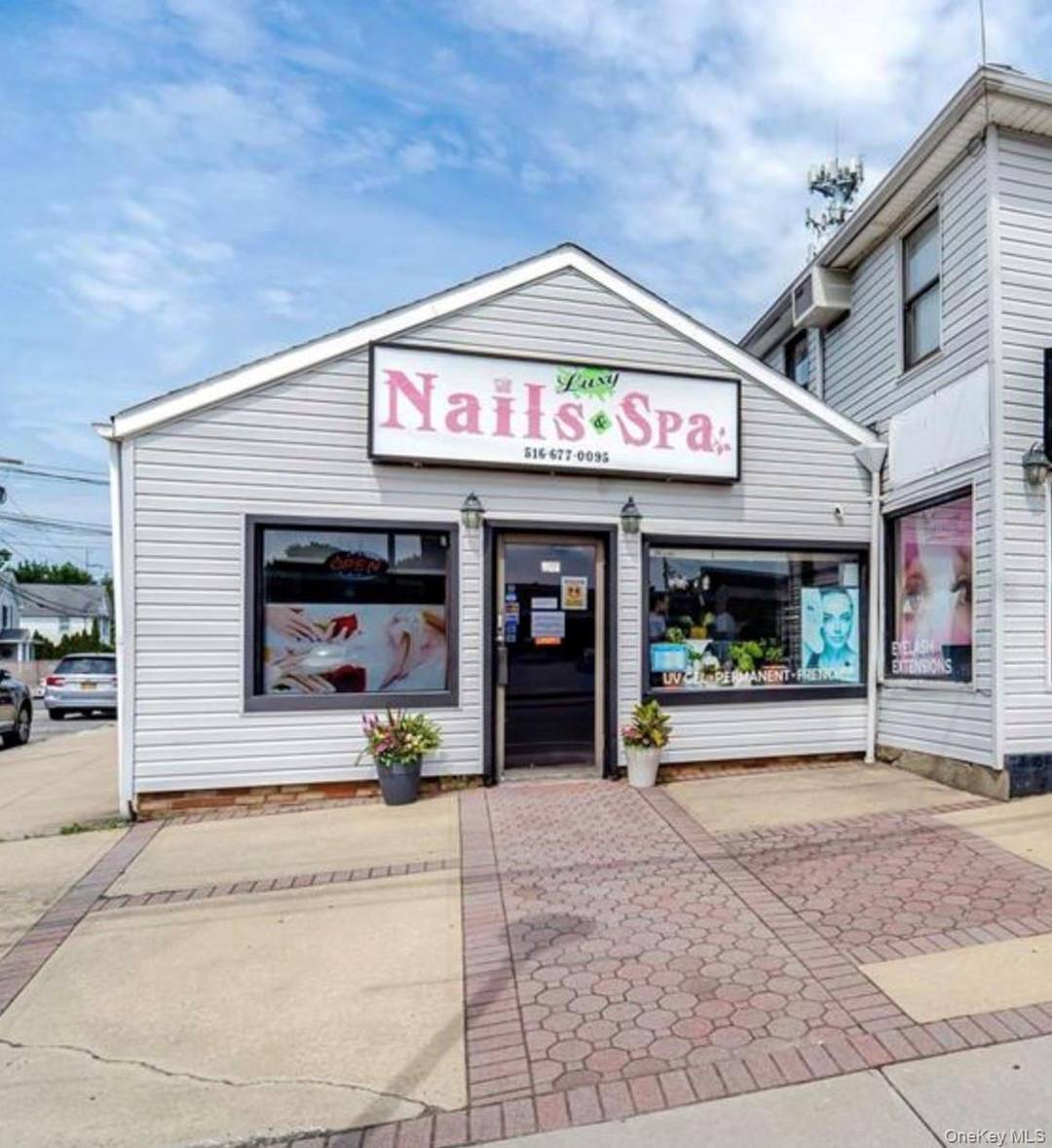 Prime corner commercial space located at 120 Jackson Avenue in the heart of Syosset, offering exceptional visibility and exposure.