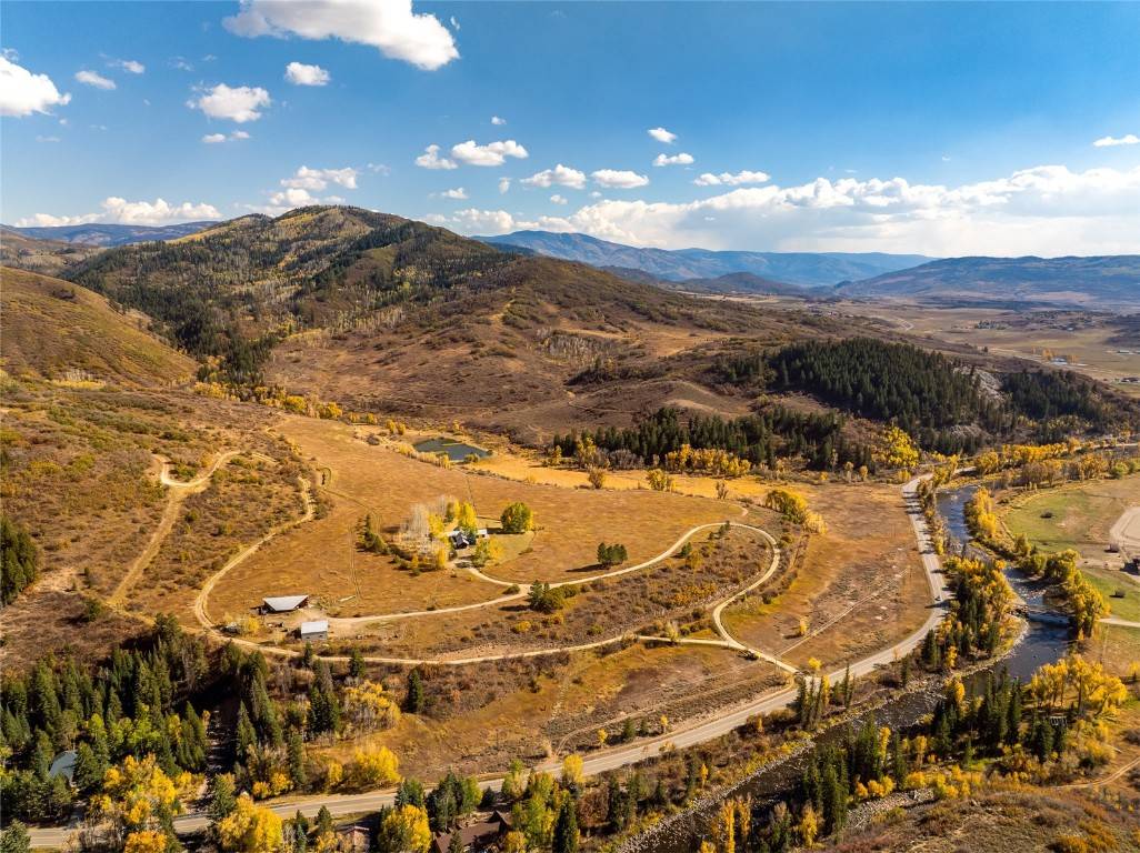 Introducing Mad Mountain Ranch, a very rare opportunity on 213 acres just a short 6 miles from downtown Steamboat and this exceptional property offers over ½ mile of Elk River ...
