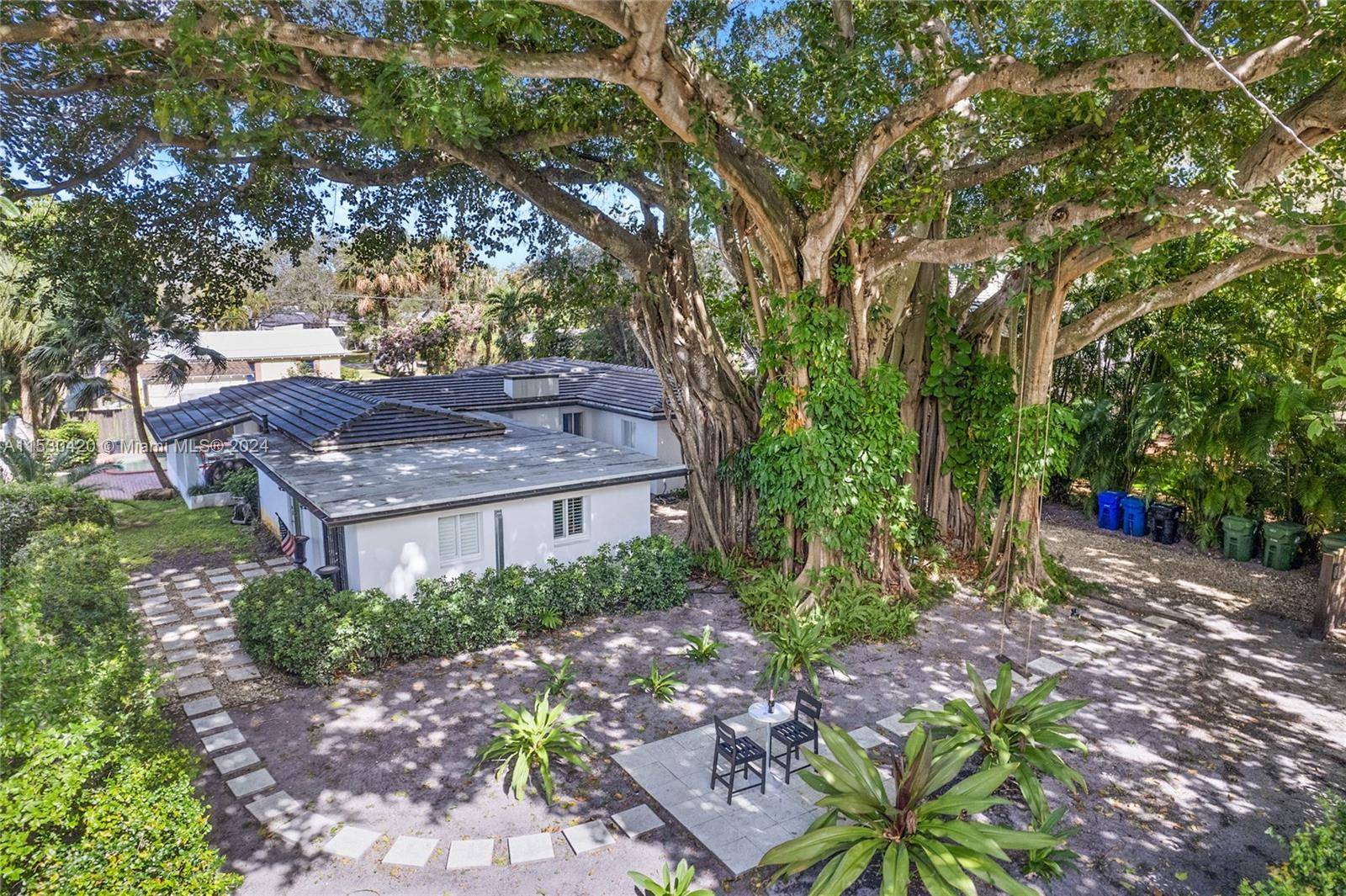 One of the most enchanting homes in the desirable River Oaks community, this unique gem is nestled in a lush tropical locale, featuring a majestic Banyan tree on a spacious ...
