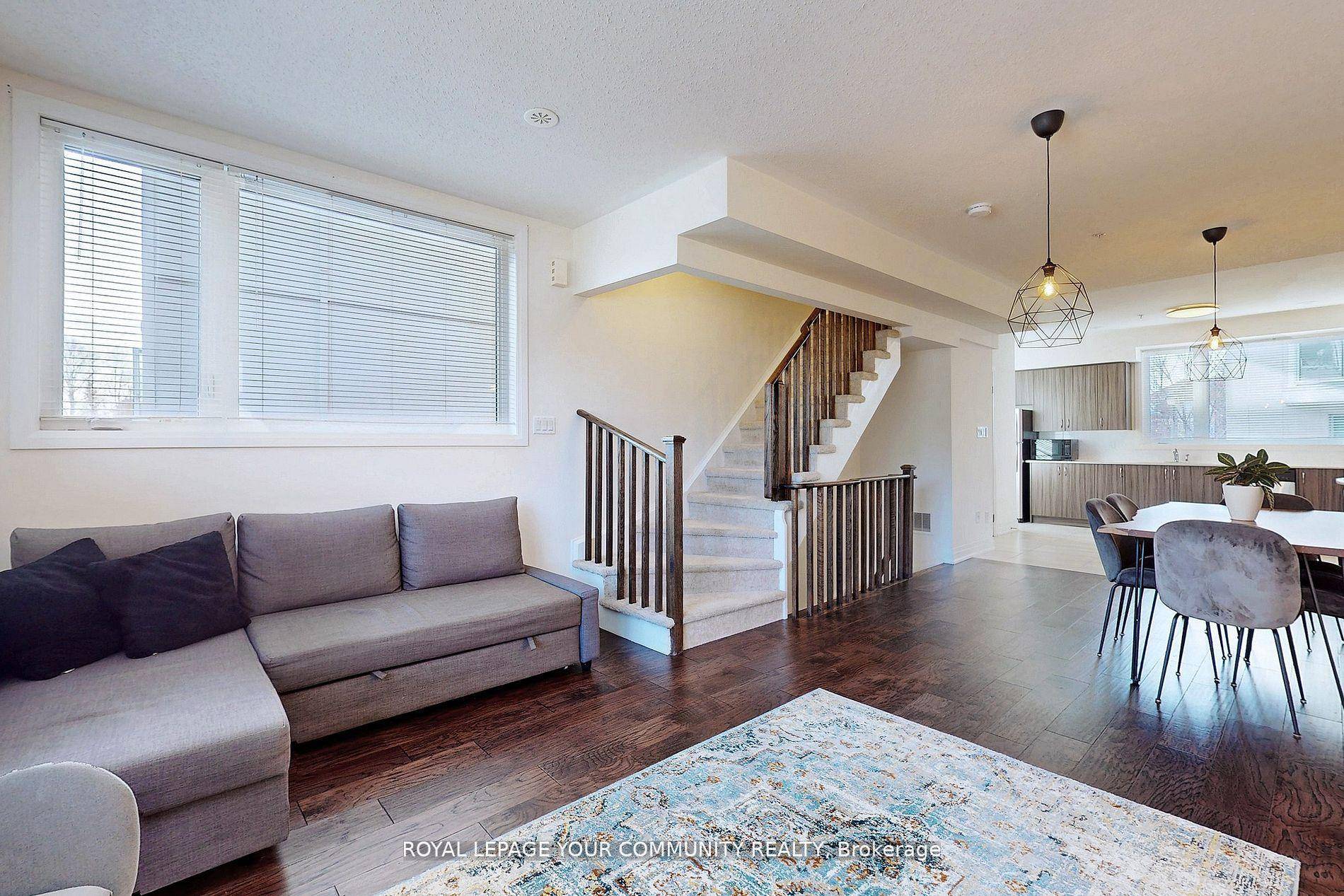 MOVE IN READY ! ! This stunning corner unit townhouse is bathed in natural light and overlooks a serene forest and conservation area.