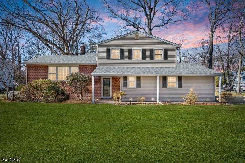 Nestled in a beautiful, tree lined neighborhood, this well maintained 4 bedroom, 2.