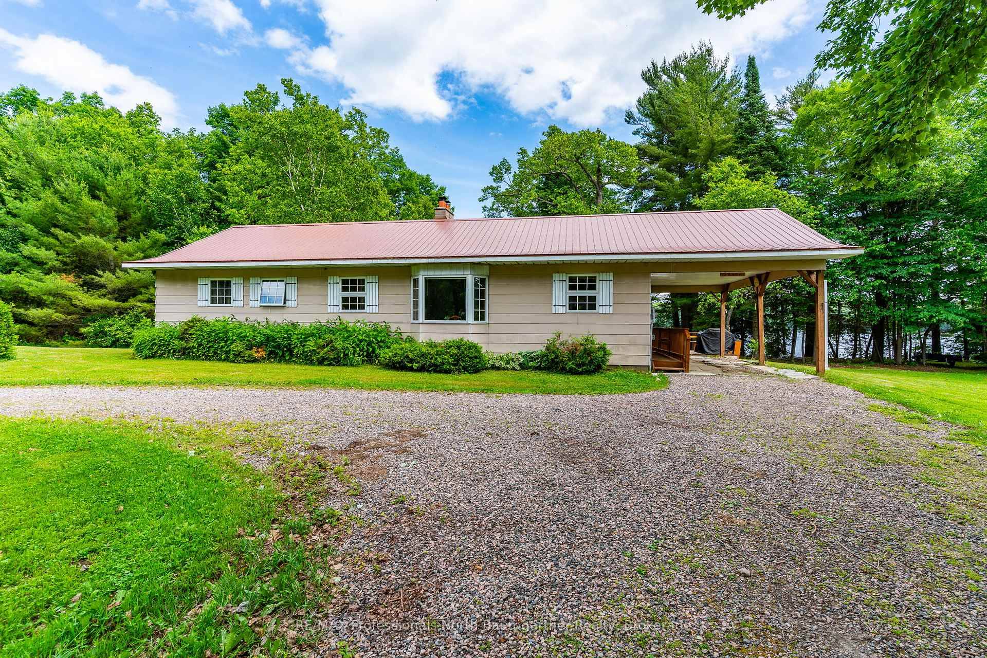 Welcome to your private Beech Lake retreat where timeless charm, natural beauty, and endless potential meet.