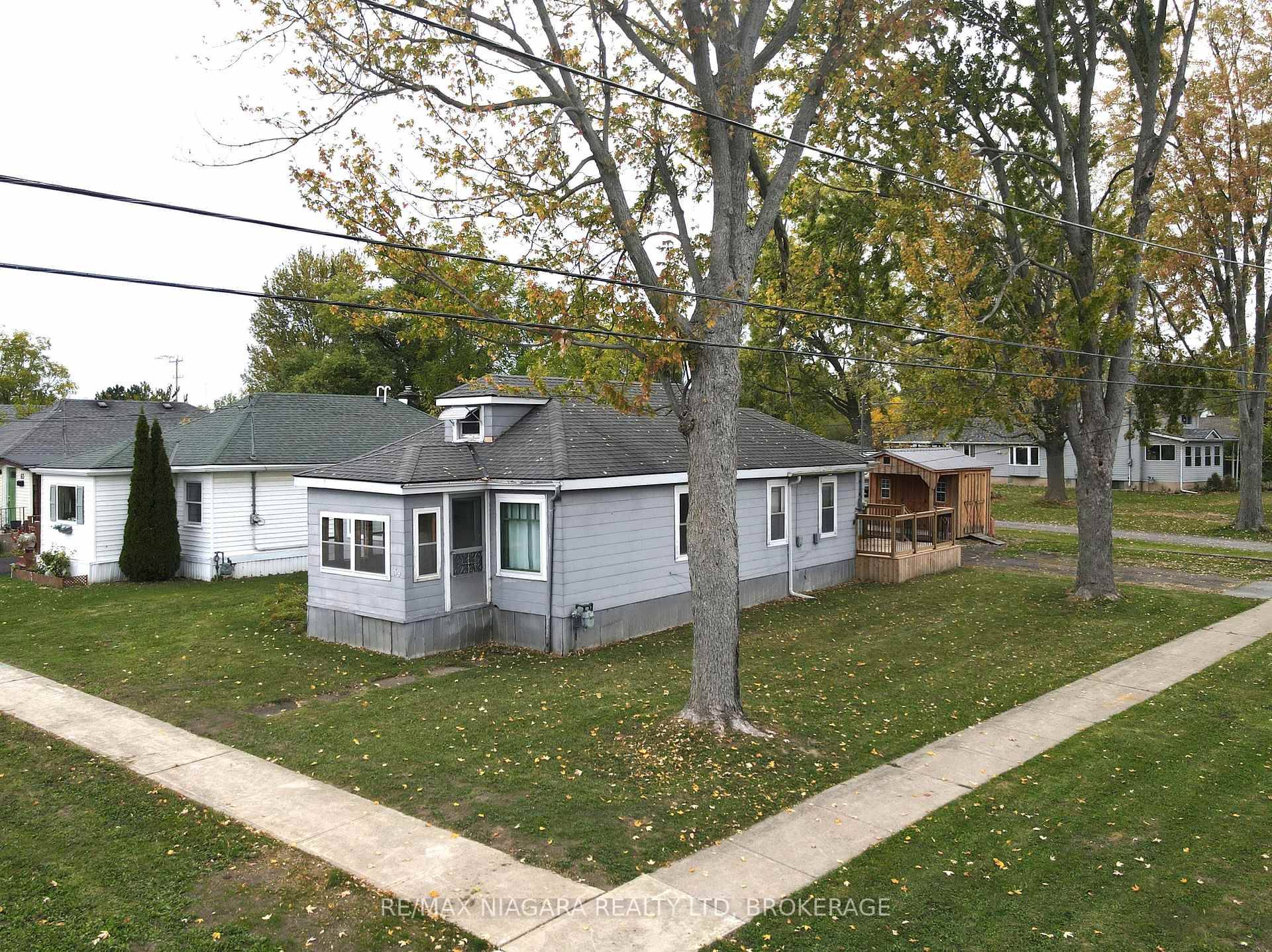 This charming 3 bedroom home sits proudly on a spacious corner lot surrounded by mature trees and lovely neighbouring properties.