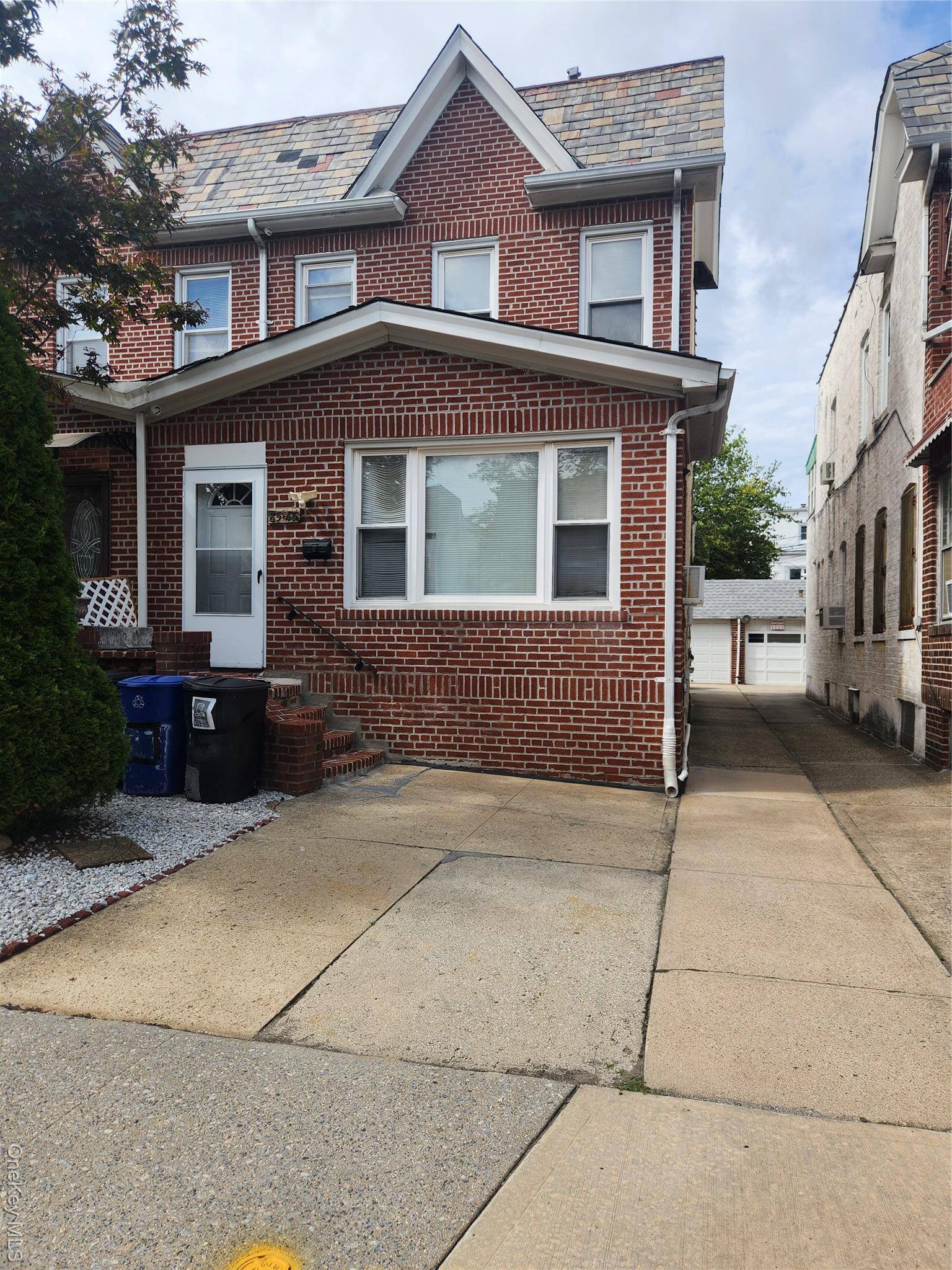 Don t miss the chance to own a beautiful brick, semi detached legal two family home in one of the most desirable neighborhoods of Queens.