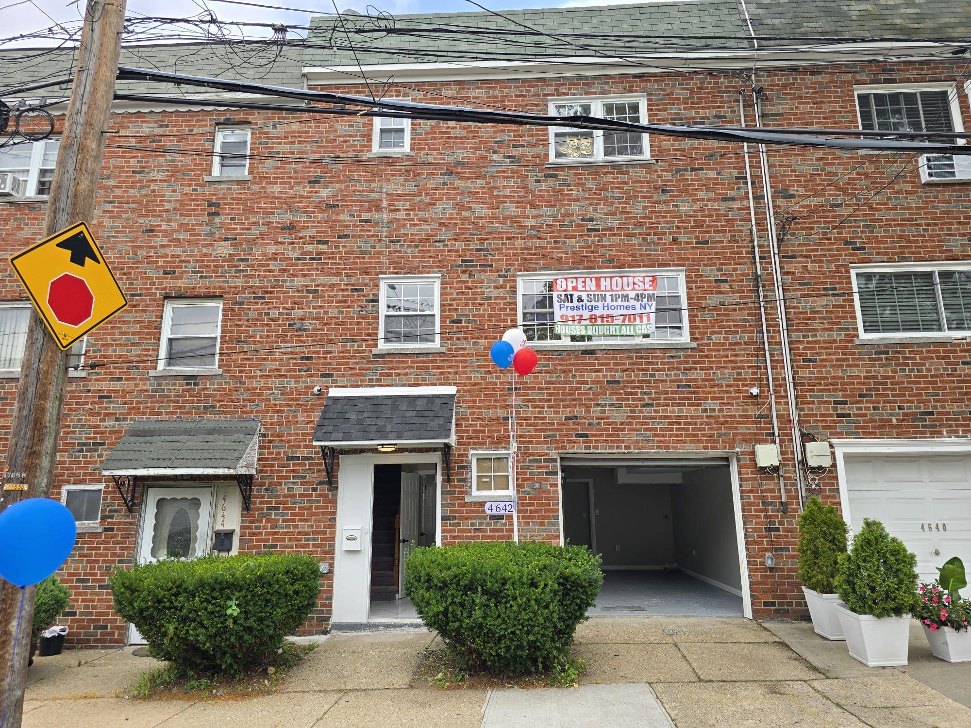 This beautifully renovated three story brick home offers a perfect blend of modern comfort and functionality.