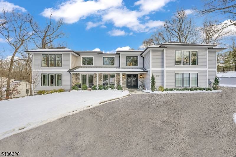 A true statement of luxury, this fully reimagined three story Colonial at 315 Freemans Lane sits on a beautifully landscaped one acre property in a premier neighborhood and was rebuilt ...